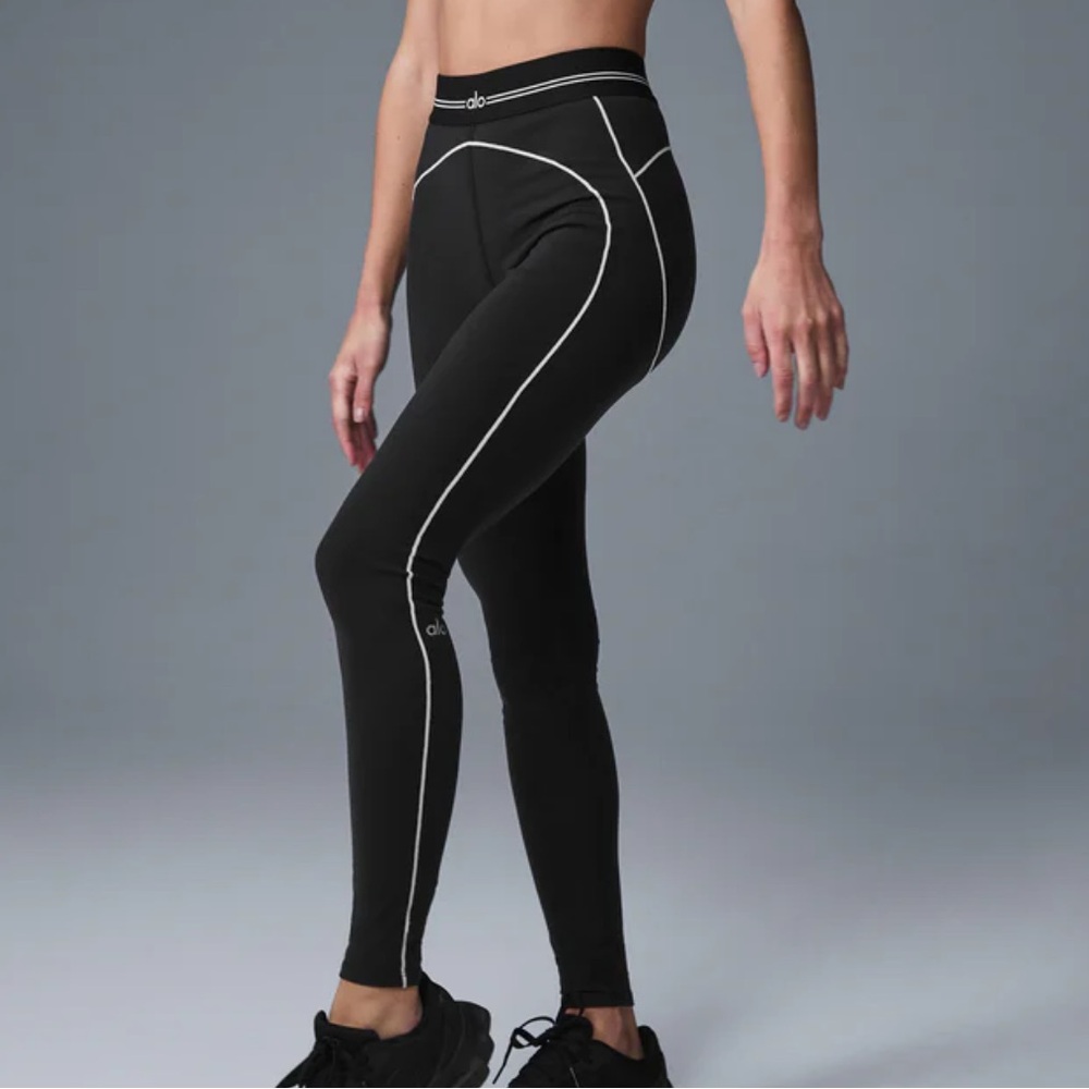Alo leggings worn with small stain size M